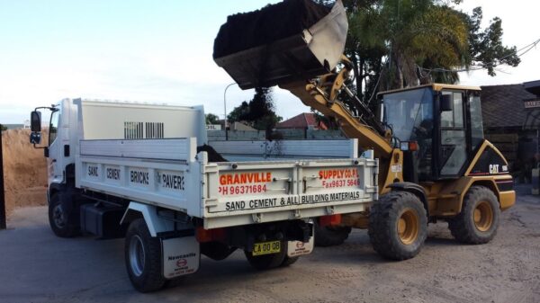 Loading soil on our truck